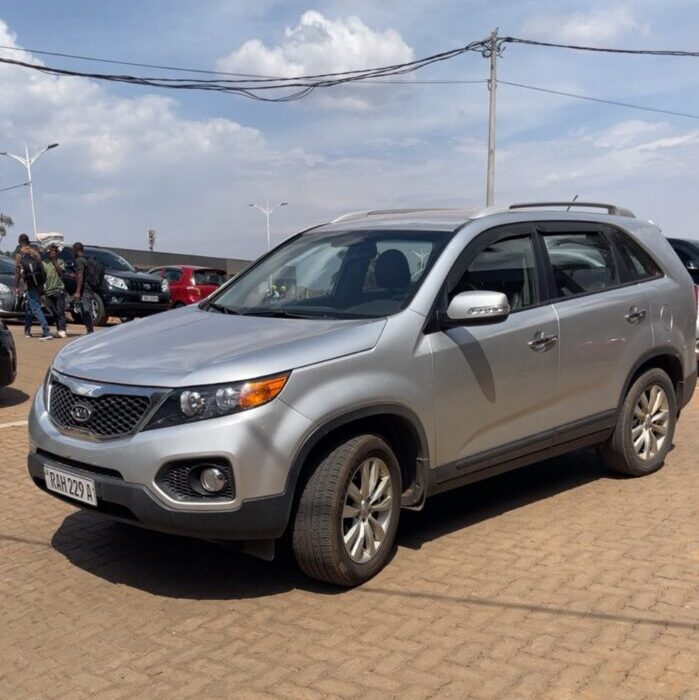 Monthly car rental SUV parked outside an office building in Kigali, Rwanda