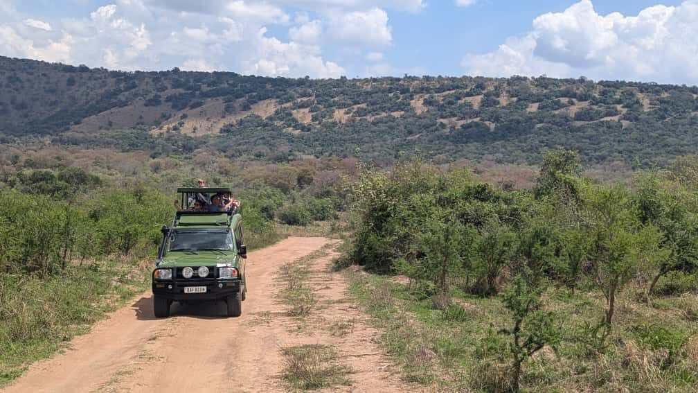 Toyota Land Cruiser safari vehicle on a track in Akagera National Park, Rwanda