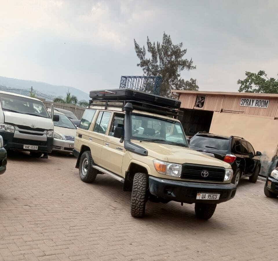 Monthly car rental SUV parked outside an office building in Kigali, Rwanda