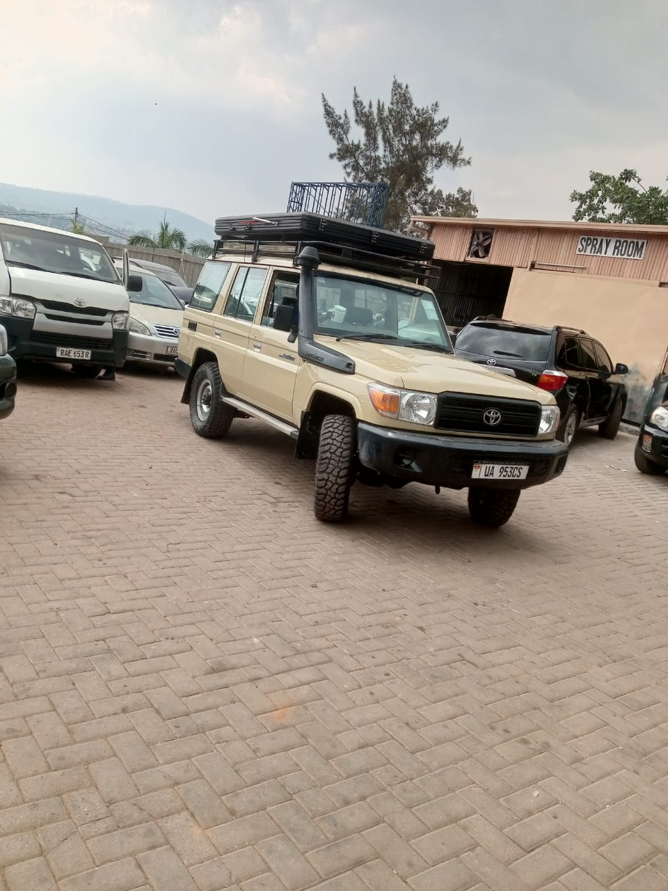 Monthly car rental SUV parked outside an office building in Kigali, Rwanda